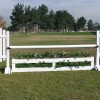 brush box in white with slant picket jump