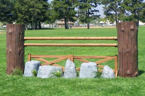 cedar split rail fence with log wings and rock set
