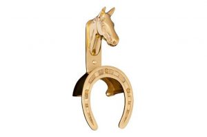 brass horse head with horseshoe