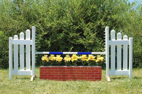 slant picket jump with wall and red brick wall